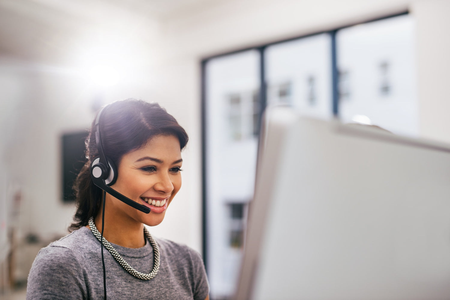 Woman answering phone in call center