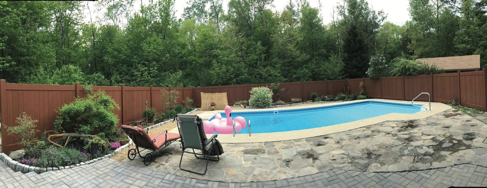 A pool surrounded by an ActiveYards fence